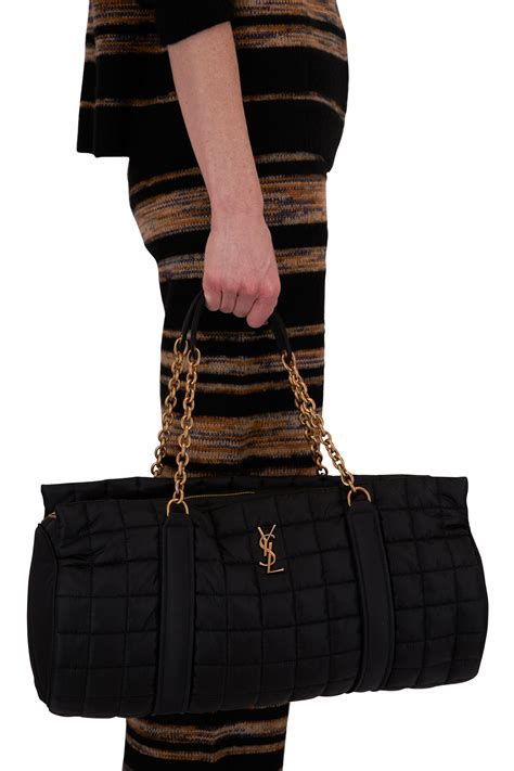 ysl overnight bags.